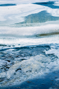 Abstract Ice and Snow One of the Reflection Lakes Melting